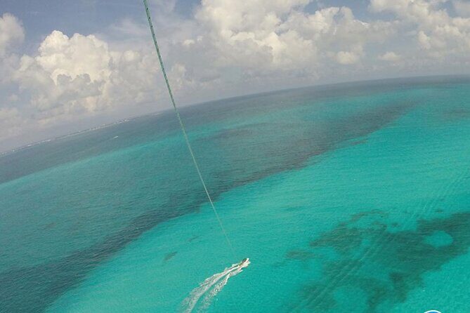 2 in 1 Parasailing and Jet Sky Tour in Cancun - Parasailing over Cancun: height, duration, and safety setup