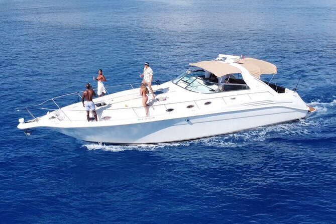4 hours - Private 48ft Yacht all inclusive in Tulum and Playa del Carmen - The virgin beach stop near the reef
