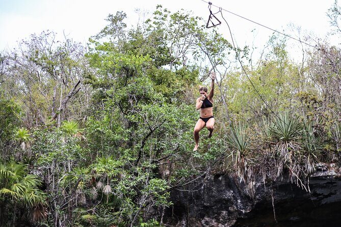 4 Private Cenotes, Zip-Lines, Canoes & Mayan Village with Delicious Lunch - Canoes and Cave Swimming: The Calm Between the Adrenaline