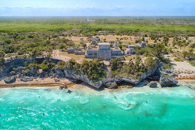 4x1: Coba, Cenote, Tulum and Playa del Carmen Tour from Cancun - Cenote Kuxtal swim: the best cooling break of the day