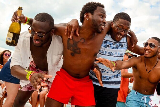 Adults only Hip Hop Sessions Boat Party Cancun - DJ/MC energy, games, and champagne showers on the water