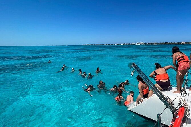 All Inclusive Isla Mujeres Catamaran - Open bar and onboard vibe: fun, but not always quiet