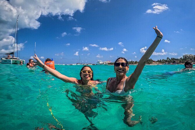 All-Inclusive Isla Mujeres Catamaran with Free Transportation - Isla Mujeres beach time: lunch, beach club access, and the sandbar swim