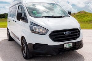 Arrival from Tulum Airport Private Transportation in Minivan - Finding Your Driver: The Black Luxury Service Booth and Name Tablet