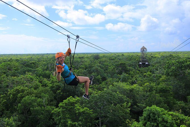 ATV Xtreme and Zipline Adventure from Riviera Maya - Zipline to the cenote: flying through the rainforest canopy