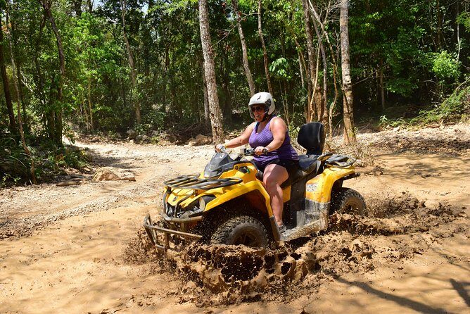 ATV Xtreme and Zipline Adventure from Riviera Maya - Cenote snorkeling: stairs, cool water, and underground views