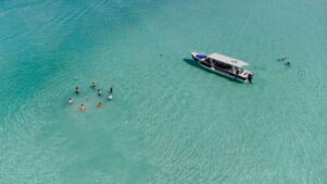 Bacalar Lagoon Sightseeing Boat Tour with Open Bar & Snack - The pirate channel swim: the first big payoff