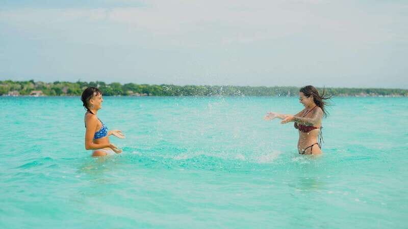 Bacalar Lagoon Sightseeing Boat Tour with Open Bar & Snack - Isla de los Pajaros: birds, photos, and a calmer stretch