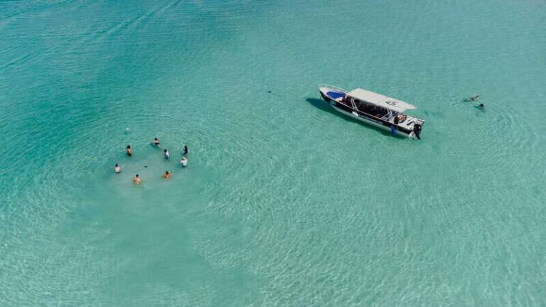 Bacalar Lagoon Sightseeing Boat Tour with Open Bar & Snack - The pirate channel swim: the first big payoff