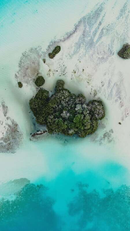 Bacalar Lagoon Sightseeing Boat Tour with Open Bar & Snack - The secret sunset stop: why the ending matters