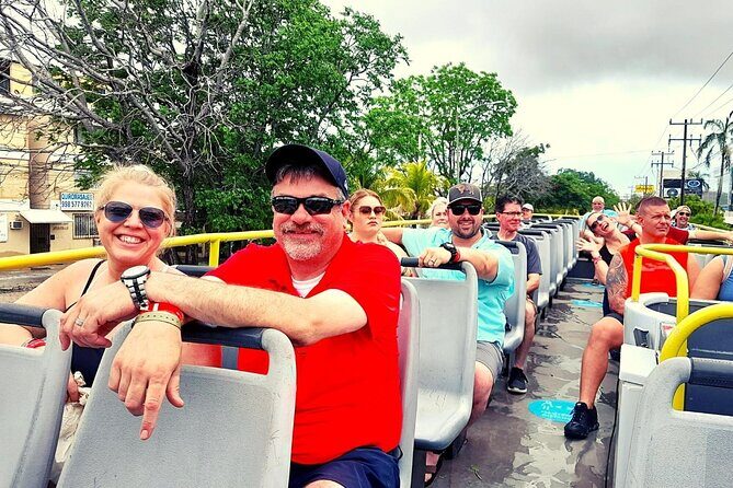 Cancun City Sightseeing and Shopping Tour on a Double Decker bus - Avenida Tulum: landmarks and the Cancun beyond the beach