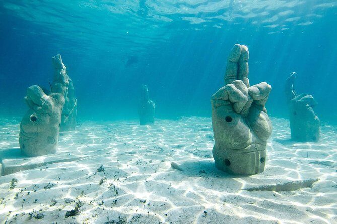 Cancun Half-Day Sailing Catamaran Cruise to Isla Mujeres - Snorkel Stop at El Meco Reef: Reef Time Depends on Wind
