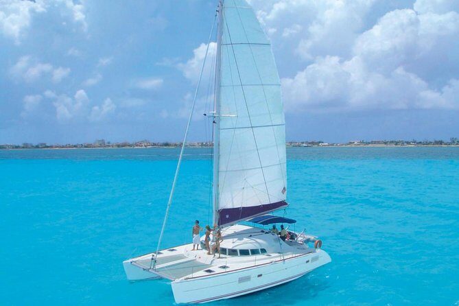 Cancun Half-Day Sailing Catamaran Cruise to Isla Mujeres - Boarding Day: Catamaran, Crew Energy, and the Party vs. Comfort Balance