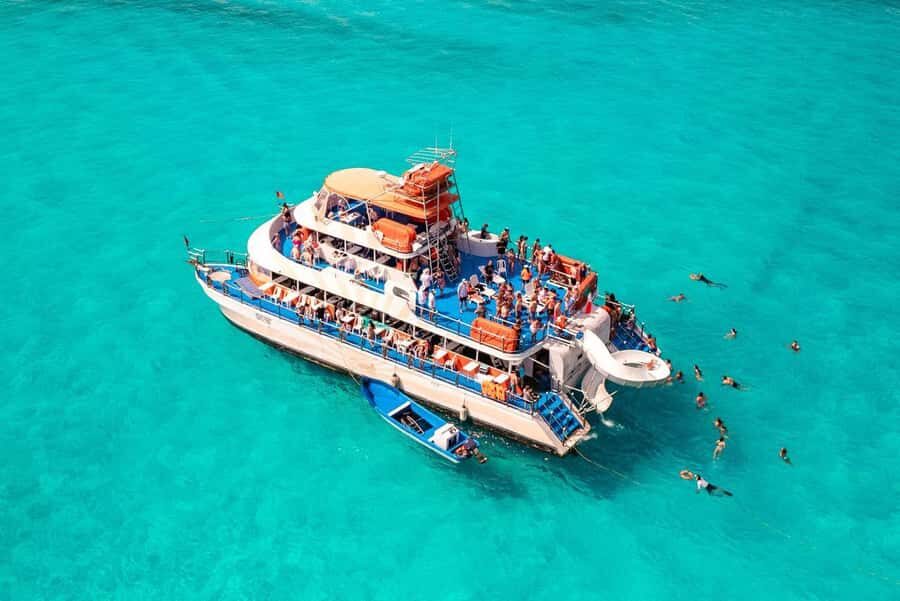 Cancun: Isla Mujeres Full Day Dancer Cruise - On Board: The 3-Story Catamaran Setup (Lounge, Slide, Party)