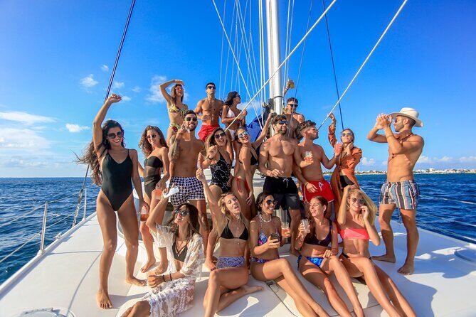 Catamaran to Isla Mujeres Snorkeling Tour with Open Bar and Lunch - The catamaran day plan (8.5 hours): fun, not fancy, and usually crowded