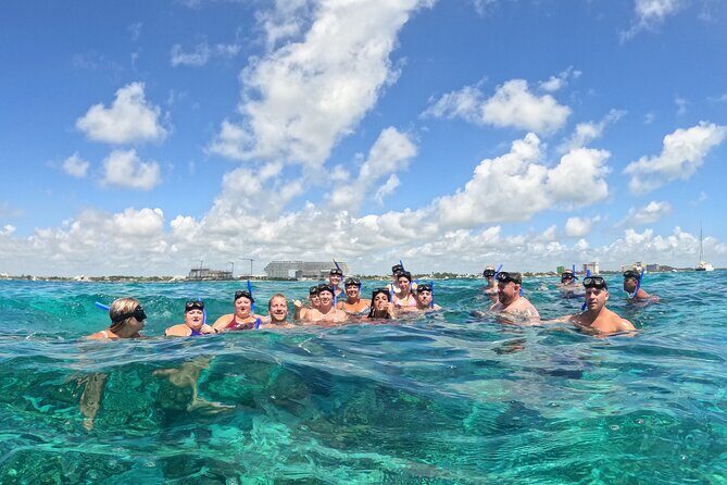Catamaran with Snorkeling and North Beach, Isla Mujeres - Isla Mujeres free time: beaches, murals, and a wave-collision viewpoint