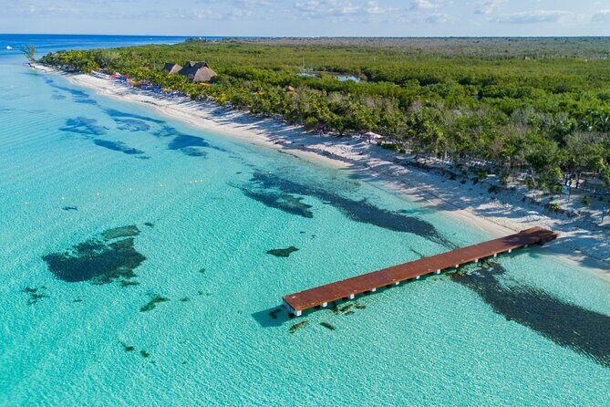 Cozumel: KUZÁ Beach Pass with Buffet, Open Bar & Activities - Beach time and water conditions: shaded loungers, hammocks, and water shoes