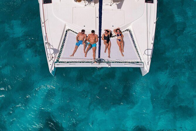 Cozumel Luxury Sailing & Snorkeling with Lunch and Open Bar Onboard - Snorkeling on a catamaran: spots, gear, and what to expect