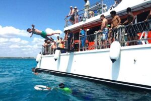 Dancer Cruise Isla Mujeres Snorkel Food and Drinks Included - The on-board party rhythm: DJs, games, and how to fit in