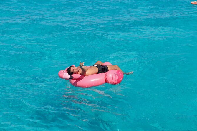 Dancer Cruise Isla Mujeres Snorkel Food and Drinks Included - Isla Mujeres with a quick beach break: two hours to reset