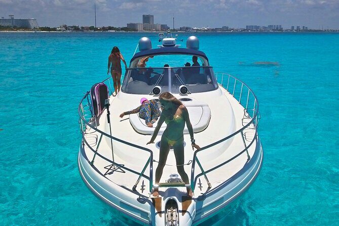 DIVA 60ft Elite Italian Yacht Experience in Cancun - On-Board Comfort: Lilly Pad, Paddle Board, and Included Drinks