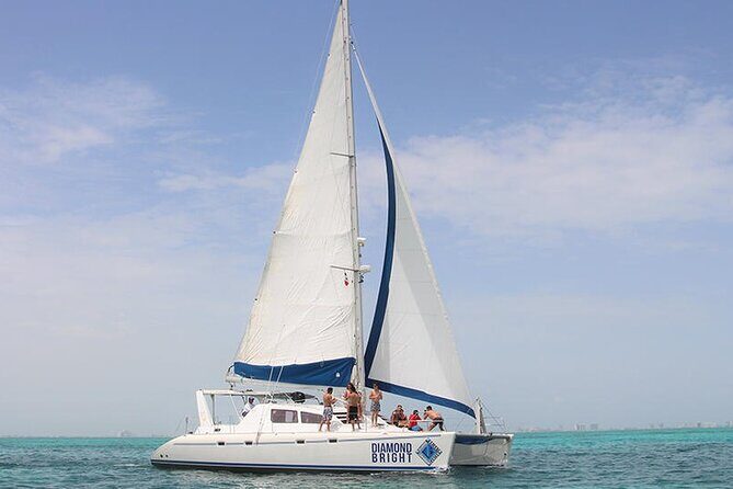 Full-Day Luxurious Catamaran Adventure - Cancún to Isla Mujeres - Crew Energy on Deck (and a Note on Language)