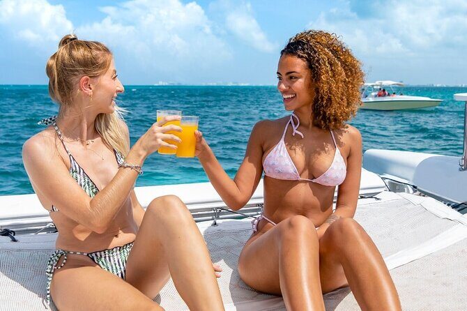 Full Experience Isla Mujeres: Food aboard + Premium drinks + Snorkel + Free time - Catamaran to Isla Mujeres: What This Day Trip Really Feels Like