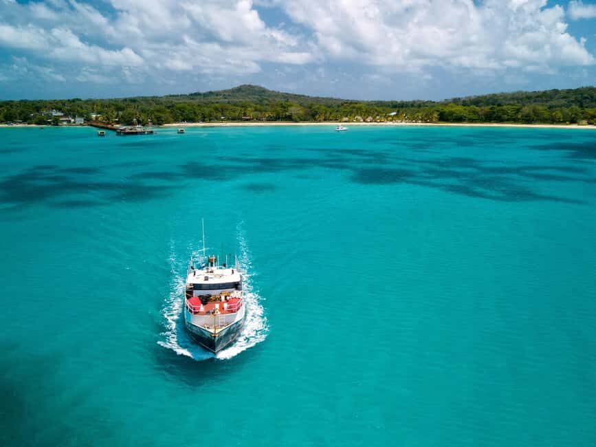 Isla Mujeres: Catamaran Ride with Open Bar, Snorkeling, and Lunch - Return to Cancun: What the End of the Day Looks Like