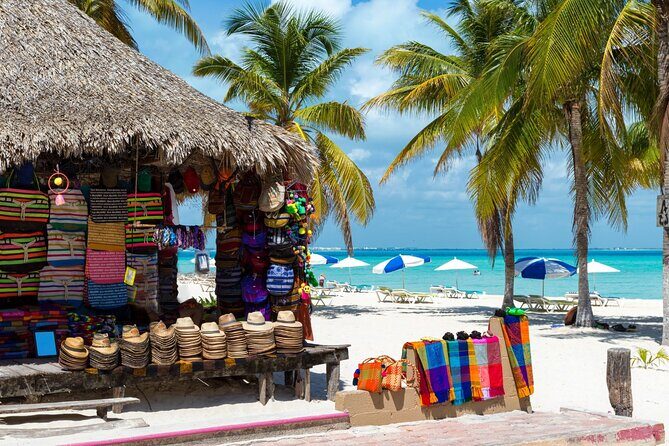 Isla Mujeres Catamaran Tour with Snorkel, Open bar and Transport - Playa Tortugas start: where to be on time and why it matters