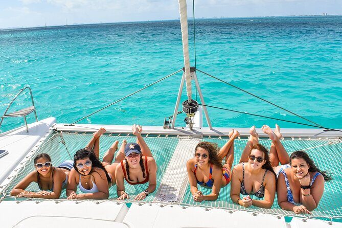 Isla Mujeres Catamaran Tour with Snorkel, Open bar and Transport - Buffet lunch and the open bar: fun perks with some quality swings