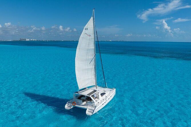 Isla Mujeres Day Tour with Catamaran, Snorkeling & Beach Club - Snorkeling at Bahia Mujeres: The Best Part, With Real-World Limits