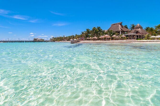 Isla Mujeres Day Tour with Catamaran, Snorkeling & Beach Club - On Board: Crew Energy, Photo Packages, and the Pace of the Day