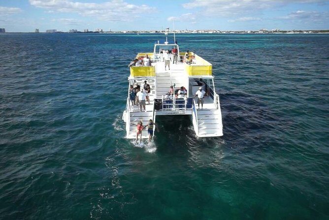 Isla Mujeres Unlimited! Fun & Party with transportation - On-Board Energy: Music, Sax, and Crew Who Keep the Day Moving