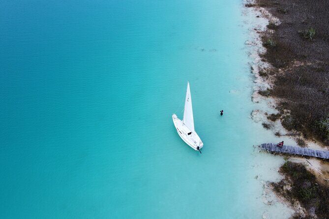 Private sailing tour of Bacalar Lagoon - Snack break on the water: fruits, beers, and cold drinks
