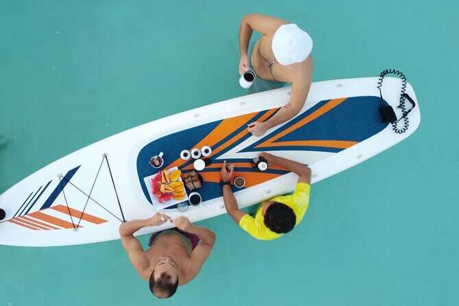 Sunrise on Paddleboard with breakfast in the lagoon of 7 colors - Black Cenote: A Darker Contrast in the Same Morning
